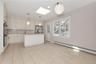 Another angle view of Kitchen, Door to wood deck