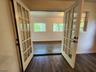 French doors to porch room