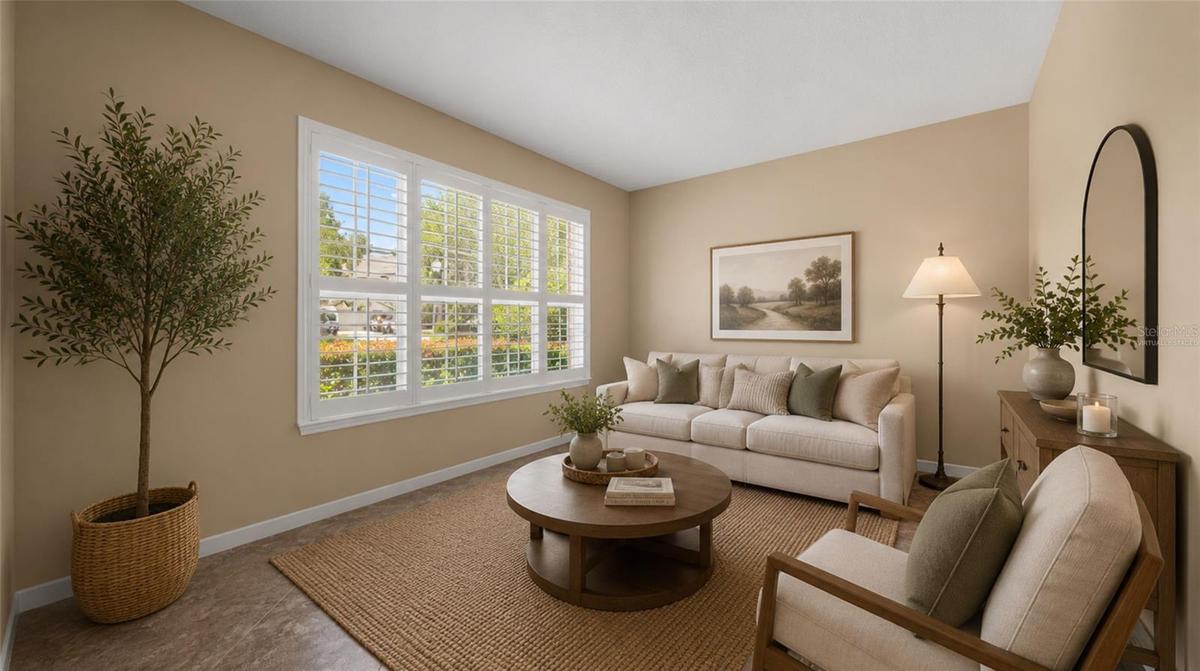 Separate flex space for formal living room, piano room, or home office. (virtually staged)