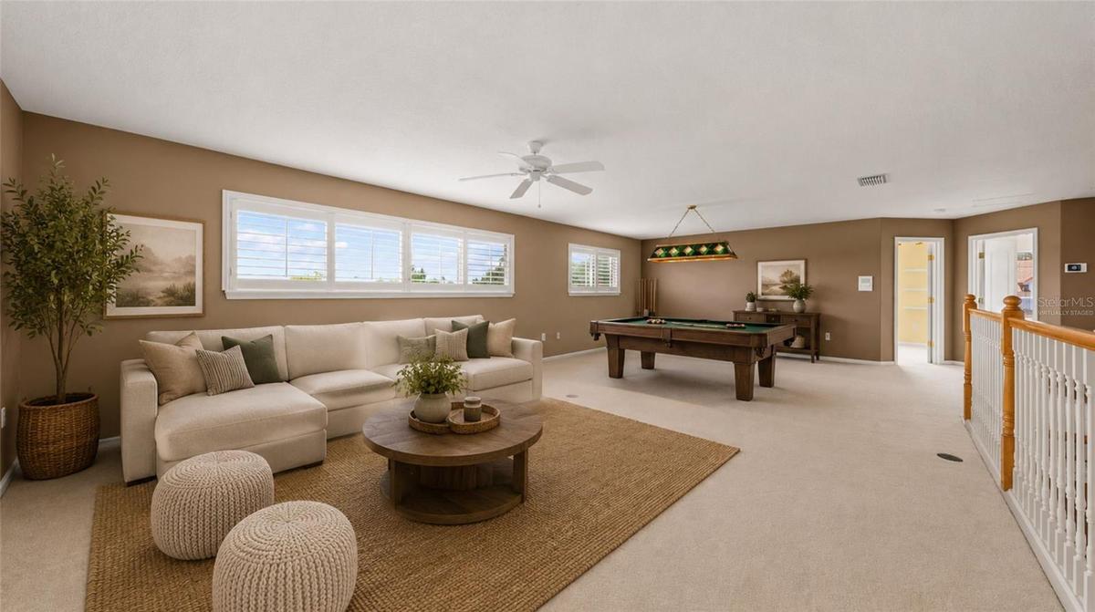 Extra large loft for family time, complete w/ pool table & card/game table. (virtually staged)