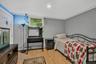 Additional room ideal for a home office, guest room, playroom, or hobby space.