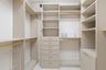 Primary Closet with Built-In Shelving