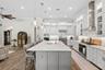 High ceiling and quality craftmanship throughout this upgraded kitchen.
