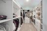 Large master closet! Custom shelves and lighting (changes colors)