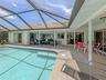This spacious home opens from the primary, formal living, kitchen and hallway to the additional bedrooms allowing you to extend your living space outd
