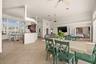 Formal dining room adjacent to kitchen