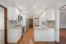Remodeled Kitchen with Granite Countertops and Stainless Steel Appliances