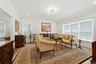 Formal living room with custom blinds
