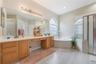 Primary bath with dual sinks and practical layout designed for everyday convenience.