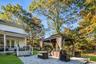 View of patio / terrace with a gazebo and a fire pit