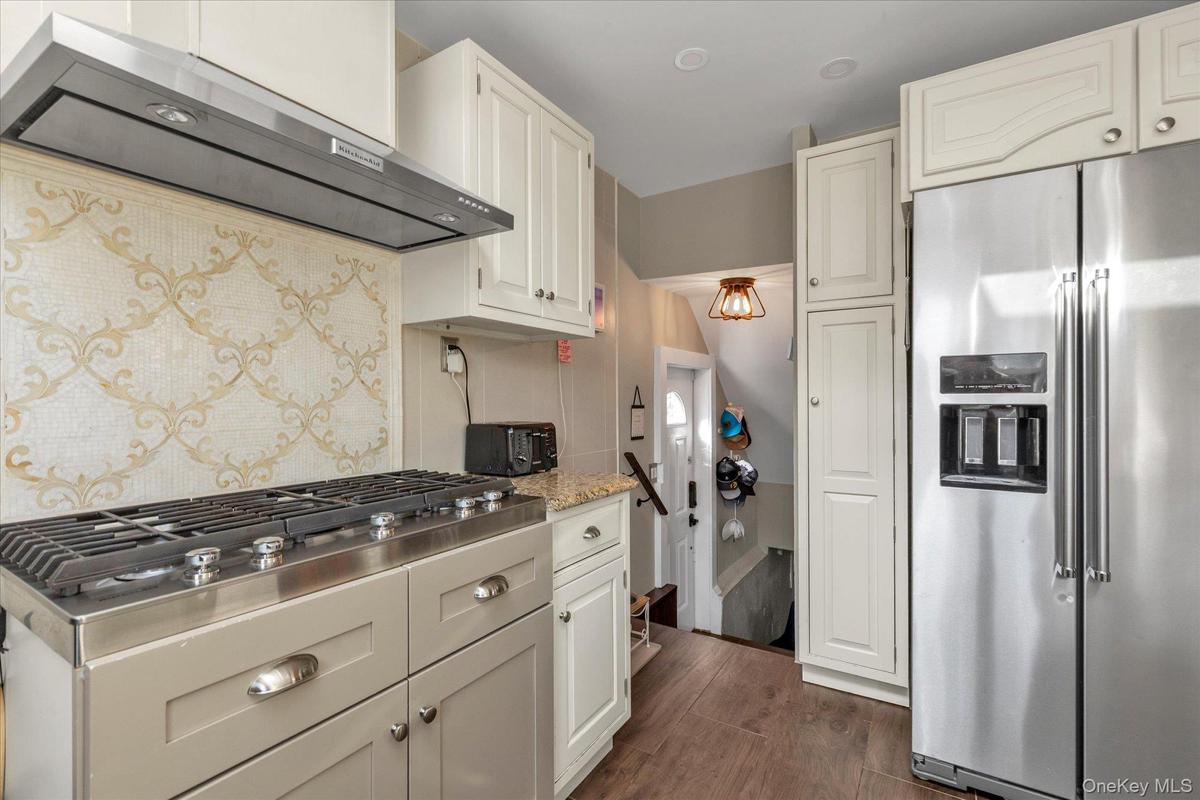Fully Renovated Kitchen With SS Appliances, Skylight, Radiant Flooring