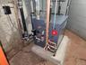 Utility room with a heating unit