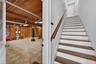 Garage 3 & 4 used as gym and stairs to Mother In Law Suite