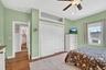Primary bedroom layout offering convenient proximity to the hallway bathroom.