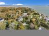 Aerial overview of property's location featuring property boundaries