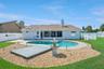 Pool Area with patio for lounge chairs