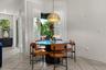 Dinette with views of lanai through your frameless fixed windows