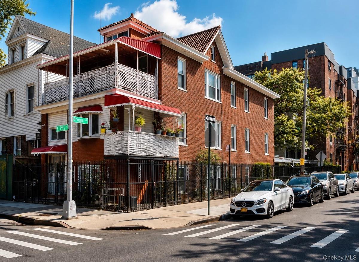 Exceptional opportunity to own a spacious three-family brick townhouse in the heart of Bedford Park. Offering approximately 4,560 square feet, this in