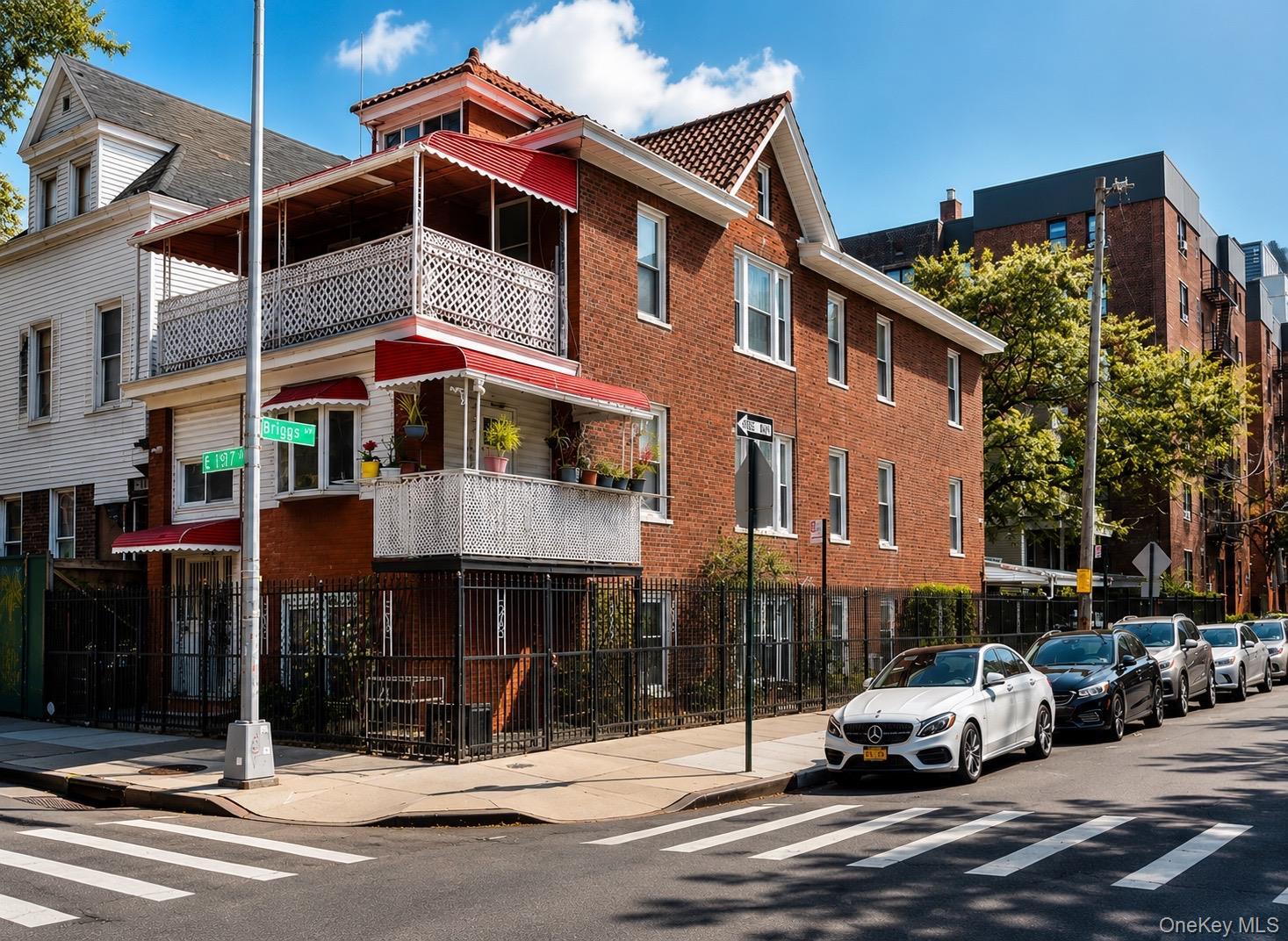 Exceptional opportunity to own a spacious three-family brick townhouse in the heart of Bedford Park. Offering approximately 4,560 square feet, this in