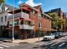 Exceptional opportunity to own a spacious three-family brick townhouse in the heart of Bedford Park. Offering approximately 4,560 square feet, this in
