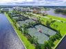 Championship tennis and pickleball courts invite an active coastal lifestyle just moments from the ocean.