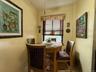 Eat in kitchen area, with large window in the corner of the building, great for ventilation