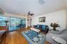 Family room space overlooking the pool
