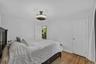 Bright and comfortable primary bedroom provides a peaceful space to relax and unwind.