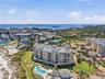 Aerial view highlighting the beachfront location and resort-style pool. Tierra Verde and the beaches close to Fort Desoto is an amazing Paradise! Liv