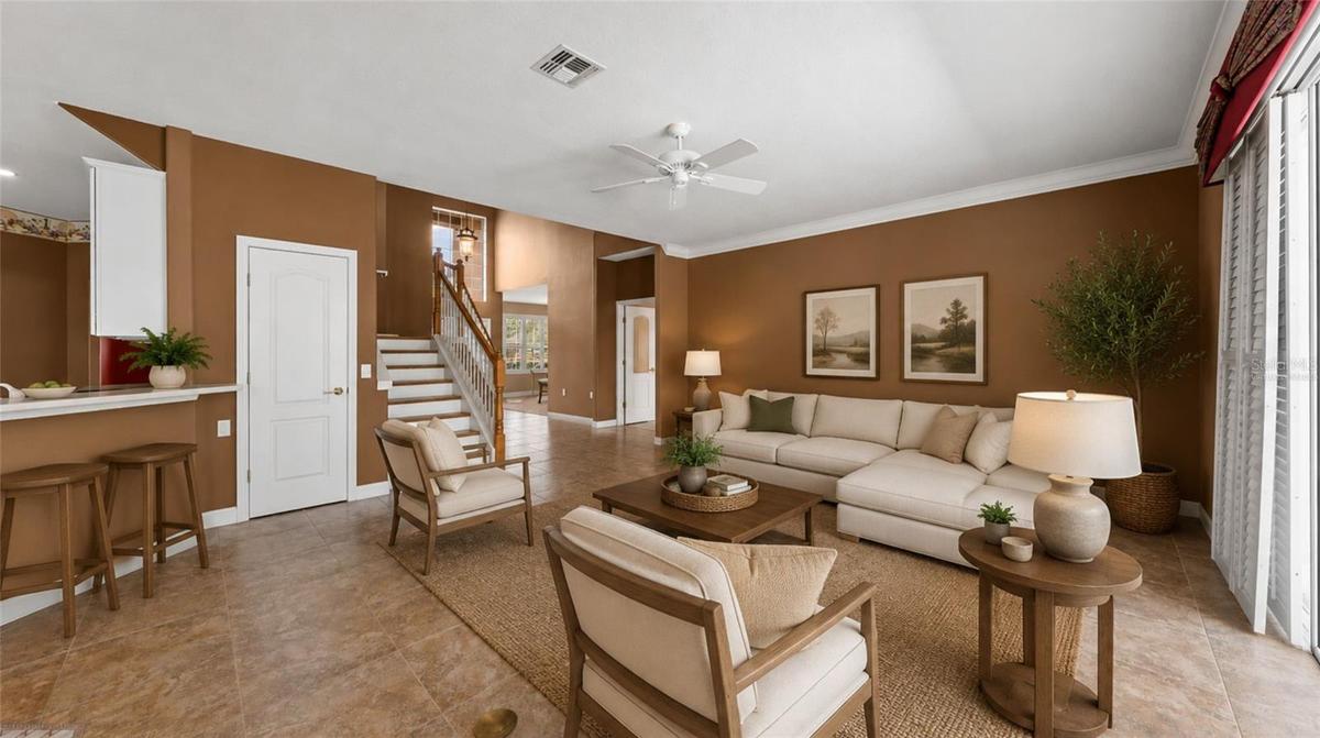 Kitchen & family room combo for easy entertaining. (virtually staged)