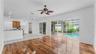 Family room with lots of sliders inviting lots of natural light