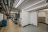 Below grade area with concrete block wall and baseboards