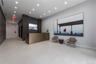 Reception featuring recessed lighting and brick wall