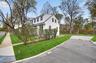 Corner lot with a spacious, level yard providing added versatility.