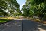 View of Spectacle Lake Drive from Smithtown Blvd. Property on Right side