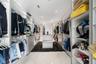 Master bedroom walk-in closet with dual access from bedroom or master bathroom