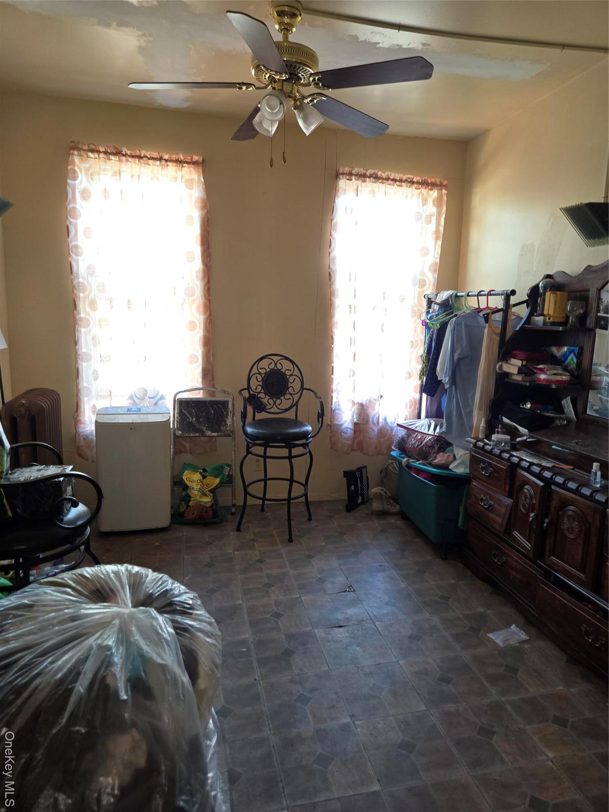 Bedroom featuring a ceiling fan