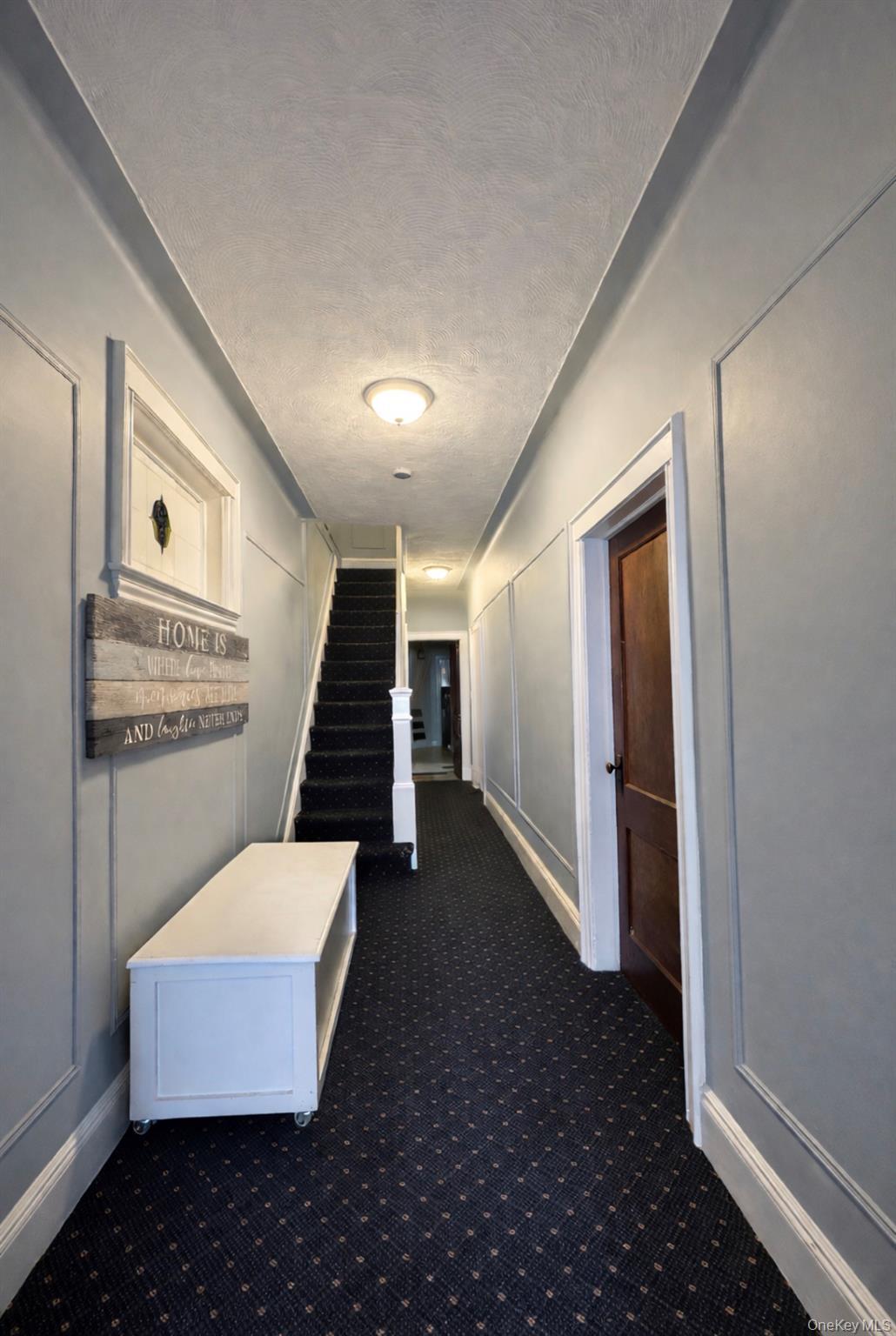 First Floor Hall two doors to right & one door straight ahead lead into the first floor apt. Door to the left before the apt door ahead, leads to Full