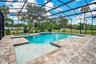 Paver Deck, Screened, Salt Water Pool and Spa, Both Gas Heated, Water and Fire Feature