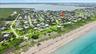 Aerial view with home identified for proximity to private beach