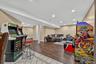 Formal Living room currently being used and a family fun room.