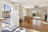 Dining room featuring a ceiling fan and wood finished floors