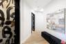 Wide main hall to powder bath