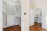 Upstairs primary dual walk-in custom closets