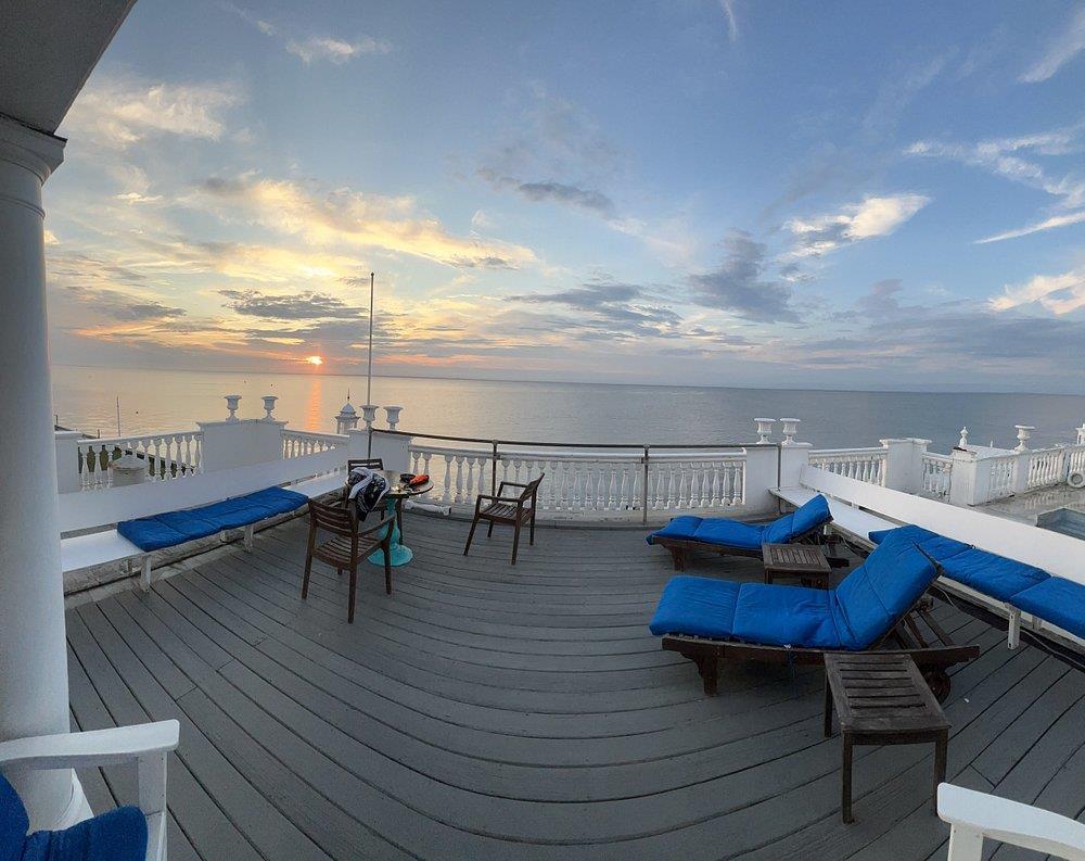 Deck at dusk with a water view