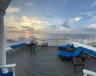 Deck at dusk with a water view