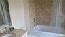 Lower level full hall bath... with tub/shower combo...