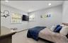 Bedroom featuring carpet, baseboard heating, and recessed lighting