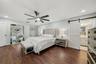 Primary Bedroom w/Barn Door to ensuite Bathroom
