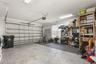 Oversized 2-car garage featuring generous storage space and room for vehicles, tools, and recreational equipment.